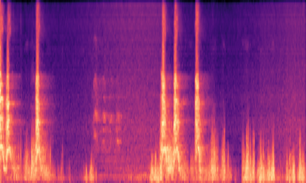 Mel spectrogram of 'A dog barking as wind blows into a microphone'