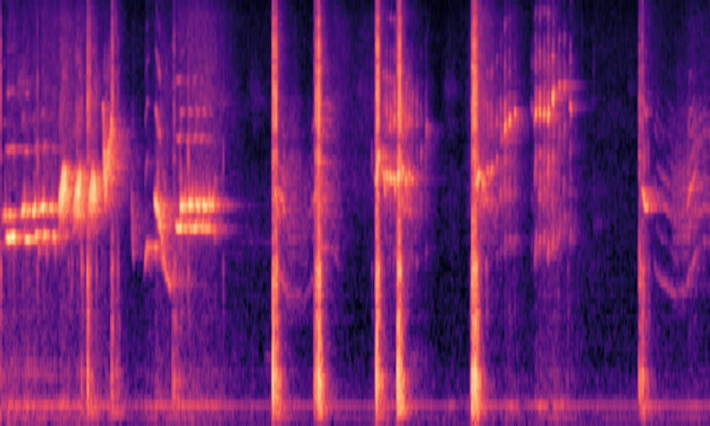 Mel spectrogram of 'Birds chirp as a metallic object strikes a surface'