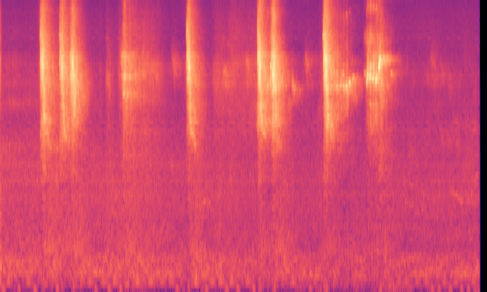 Mel spectrogram of 'Birds chirp as a metallic object strikes a surface'